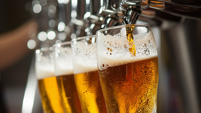 pouring beer from tap