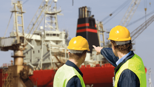 Two men shipyard